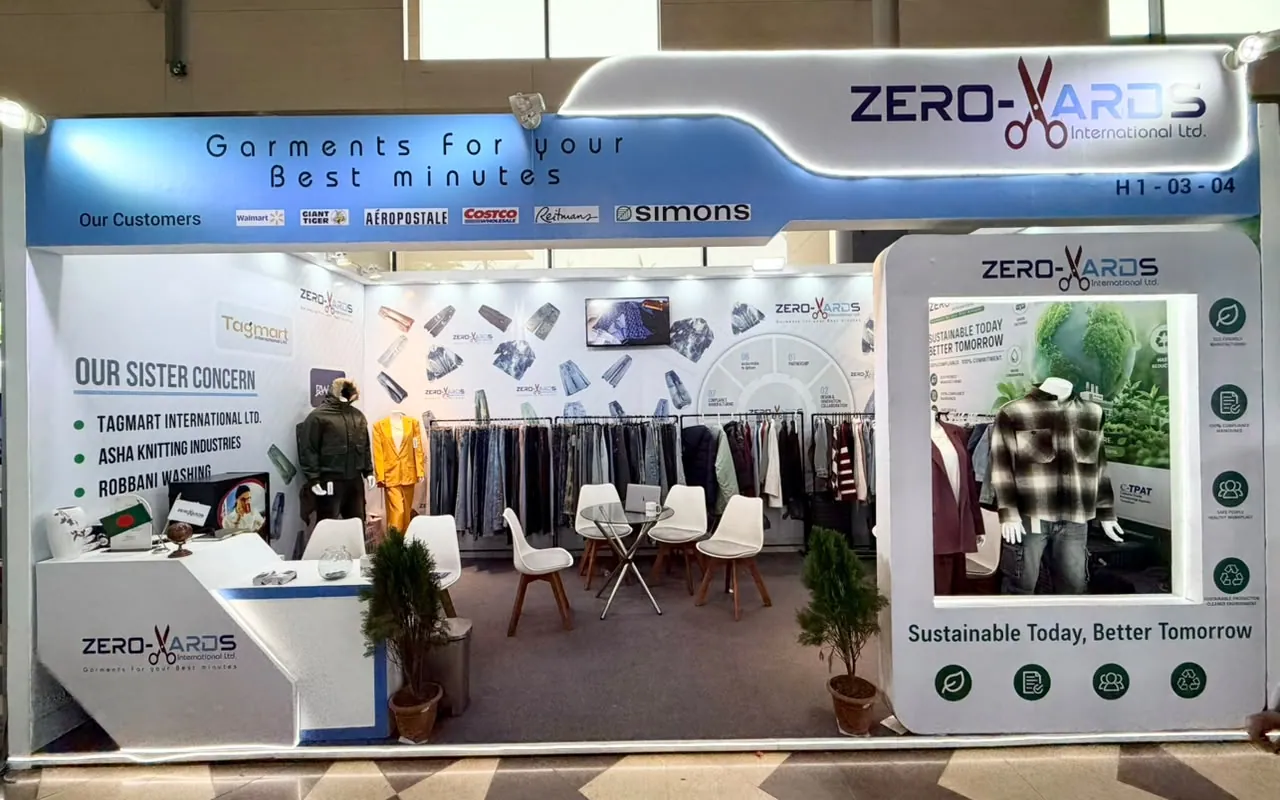Zero Yards International booth with garment samples on display
