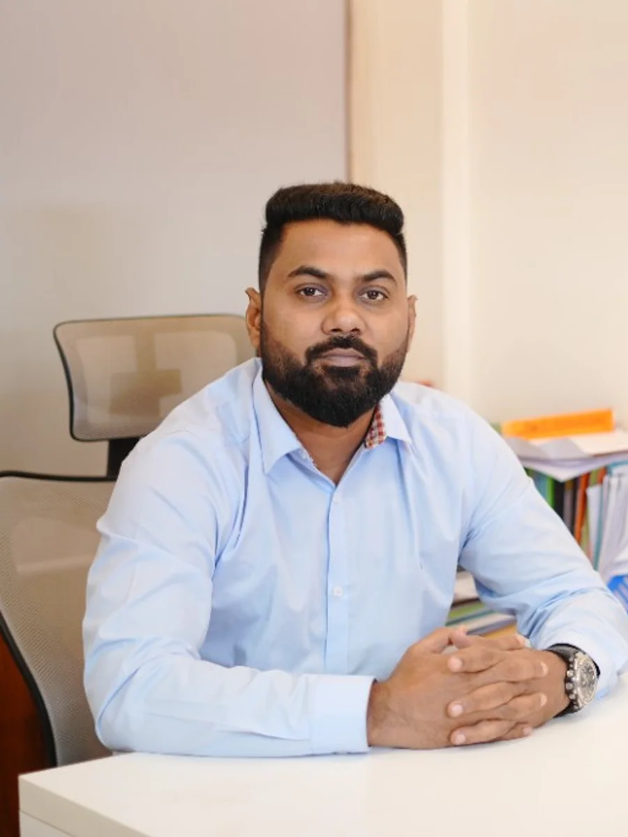 Emdadul Islam Russel, Director of Zero Yards International, at the Dhaka desk