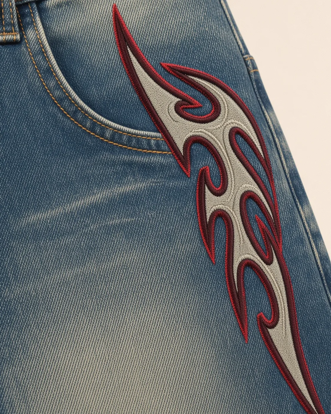 Blue graphic wide-leg jeans, construction detail, development reference