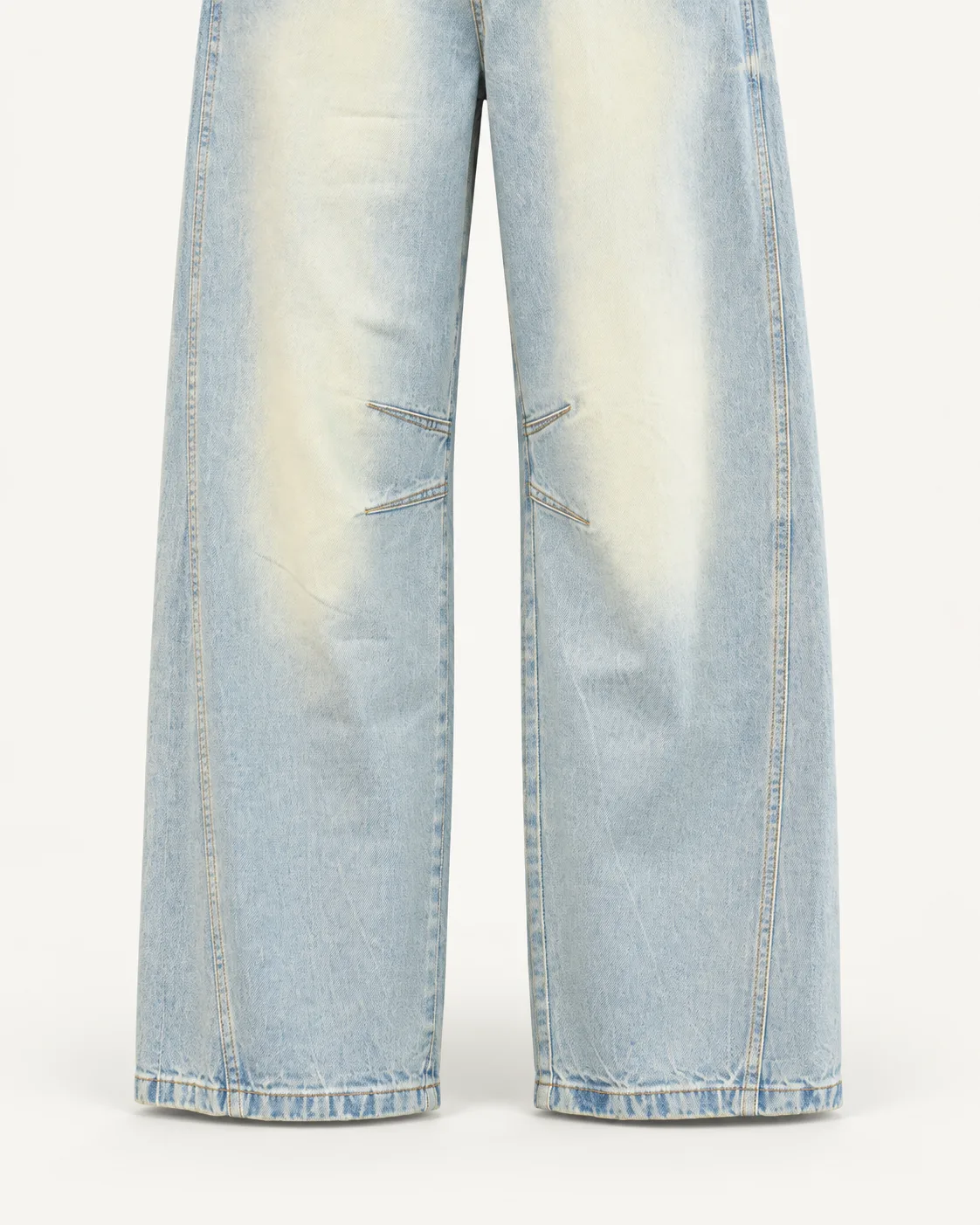 Light-wash wide-leg jeans, construction detail, development reference