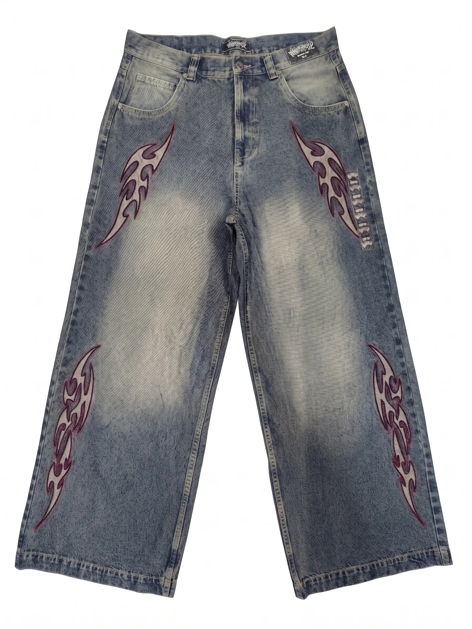 Tribal patch acid-wash jeans, front view, development reference