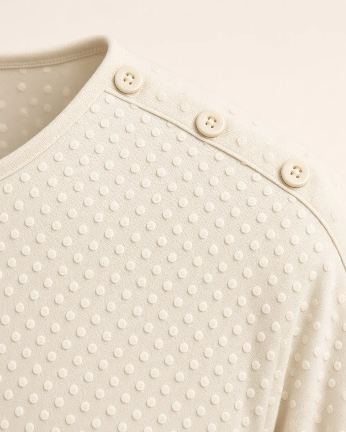 White textured pullover, construction detail, development reference